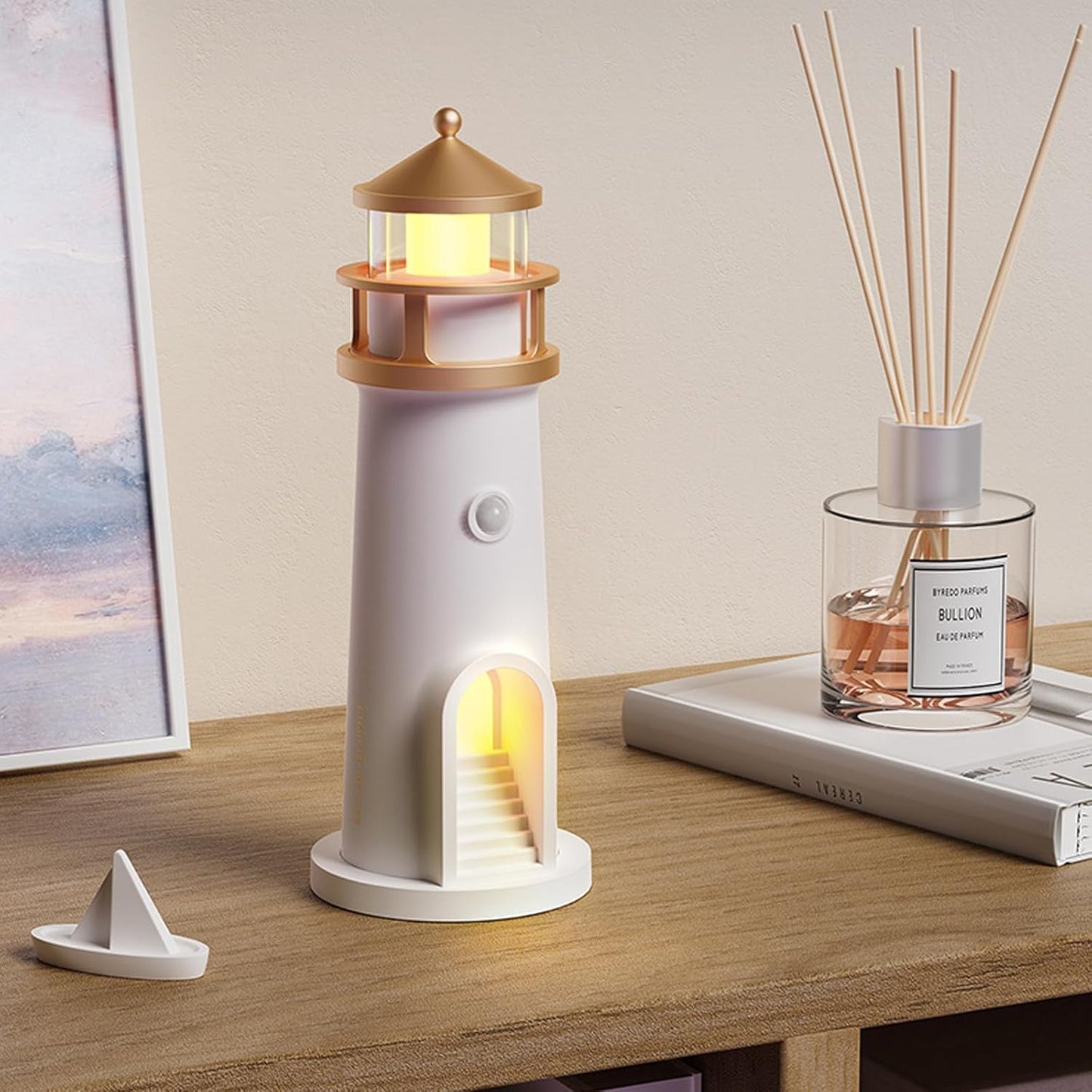Lámpara en forma de faro con altavoz Bluetooth que proyecta la luna