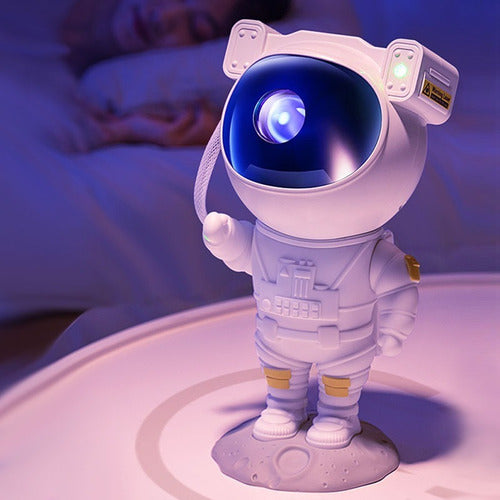 Mini Astronauta Proyector de Estrellas y Parlante